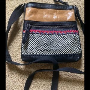 The Sak tan/black leather & woven crossbody bag